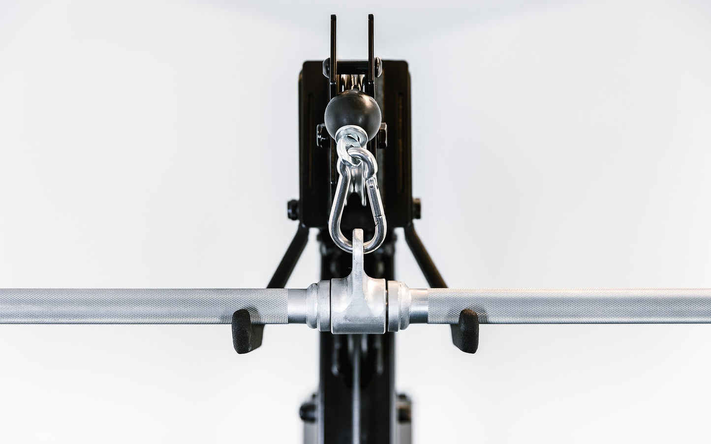48'' Solid Lat Bar cable attachment with knurled grips connected to a functional trainer from Rep Fitness UK | Shop Best Premium Gym Equipment for Home & Commercial Use Online