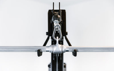 48'' Solid Lat Bar cable attachment with knurled grips connected to a functional trainer from Rep Fitness UK | Shop Best Premium Gym Equipment for Home & Commercial Use Online