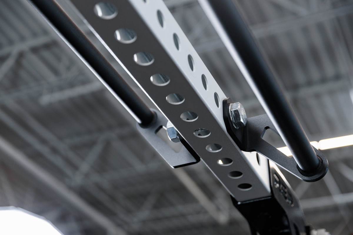 Crossmember Pull-Up Bars mounted to the front and the back of an 82 inch crossmember