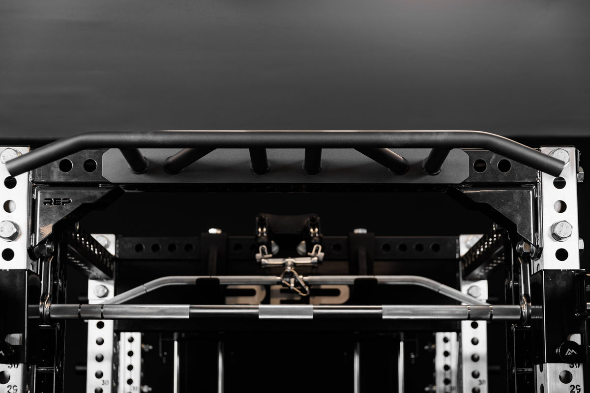 The REP Fitness Crossmember Multi-Grip Pull-Up Bar on the front of a PR-5000 rack