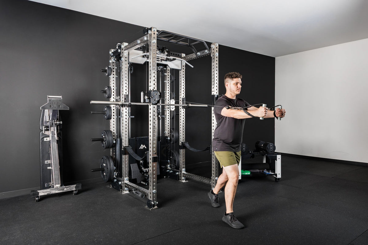 An athlete doing a cable fly exercise on the PR-5000 with an Ares 2.0