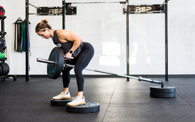 Athlete doing bent over rows with a REP® x Kleva Built® Angled Atlas™ Close-Grip on the Adroit Landmine