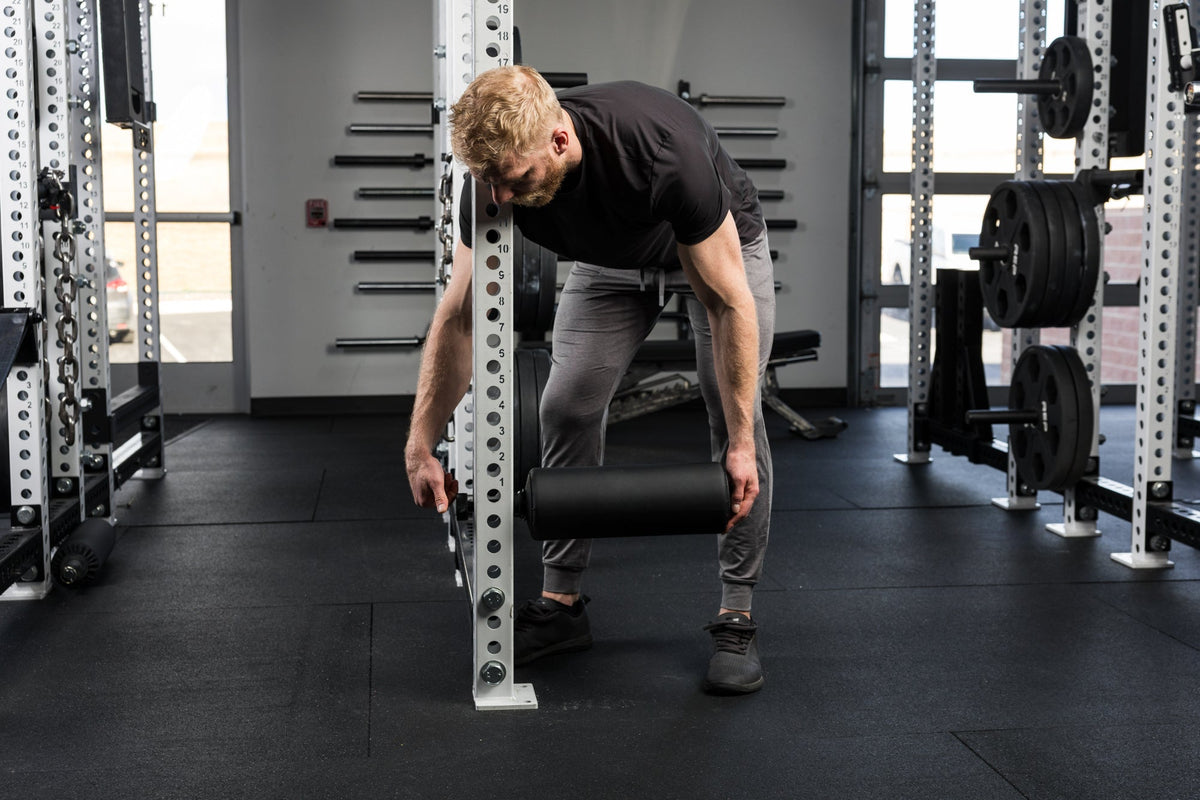 Athlete installing the Leg Roller 2.0