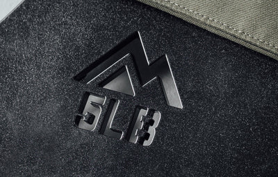 Mountain logo cutout and weight cutout on the Strata Weight Vest Plates